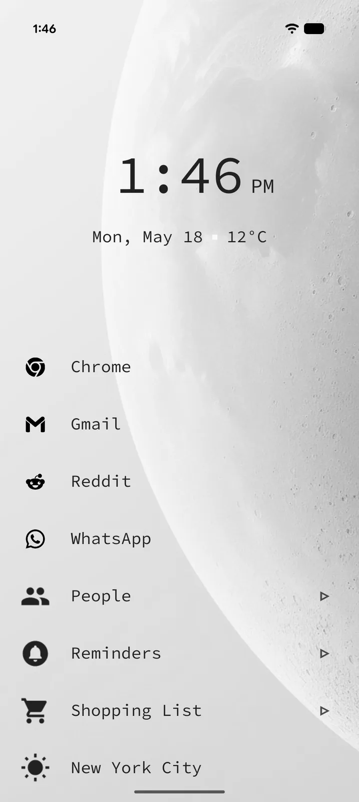 Tree Launcher home screen over a moon wallpaper